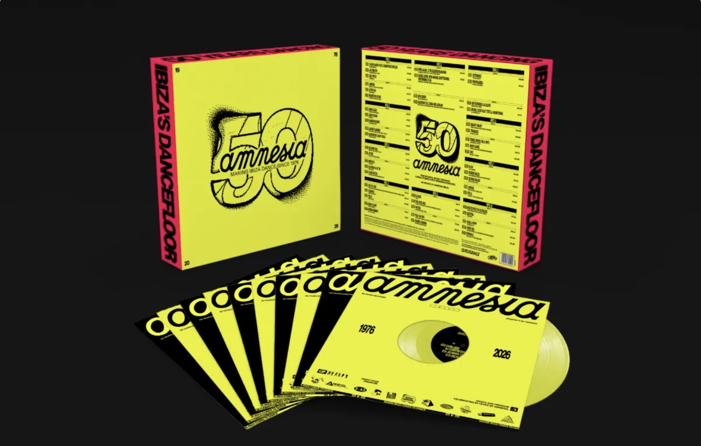 Bright yellow Amnesia 50th anniversary box set with vinyl records fanned in front against a black background, featuring bold pink edges and 'amnesia' branding.
